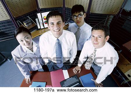 multiethnic, desk, smiling, coworkers, charts, computer View Large Photo Image Stock Image - multiethnic, desk, smiling, coworkers, charts, computer. Fotosearch