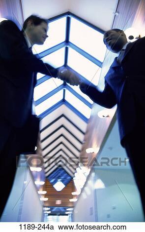 multiethnic, men, hands, blur, smiling, hallway, deal View Large Photo Image Stock Image - multiethnic, men, hands, blur, smiling, hallway, deal. Fotosearch