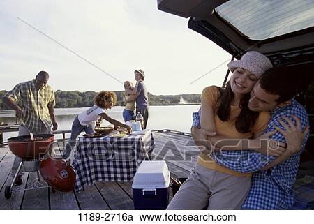 multiethnic, people, cooking, picnic, lake, outdoors View Large Photo Image Stock Image - multiethnic, people, cooking, picnic, lake, outdoors. Fotosearch