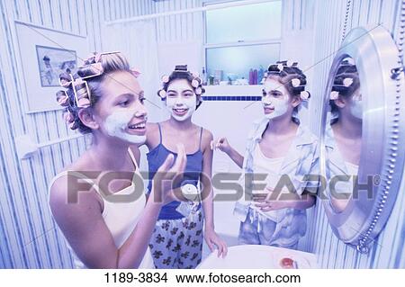 Picture - multiethnic, people, friends, teens, beauty, bathroom. Fotosearch