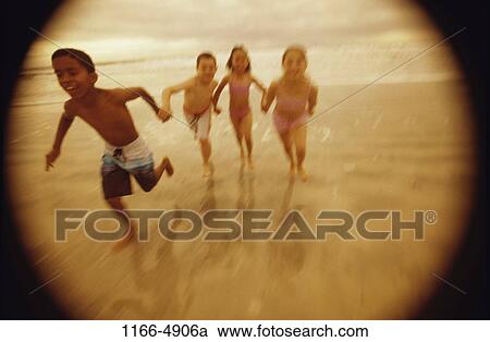 Stock Image - multiethnic, people, hands, water, running, beach. Fotosearch