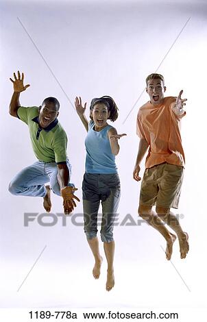 multiethnic, people, jump, jumping, excited, joyous, friends View Large Photo Image Stock Image - multiethnic, people, jump, jumping, excited, joyous, friends. Fotosearch