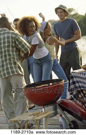 multiethnic, people, party, happy, dancing, dance, outdoors View Large Photo Image Stock Image - multiethnic, people, party, happy, dancing, dance, outdoors. Fotosearch