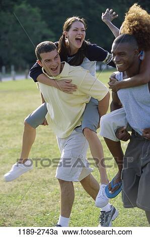 multiethnic, people, playing, racing, playful, outdoors, energetic View Large Photo Image Stock Image - multiethnic, people, playing, racing, playful, outdoors, energetic. Fotosearch