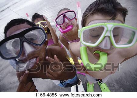 multiethnic, people, water, beach, masks, children View Large Photo Image Stock Photography - multiethnic, people, water, beach, masks, children. Fotosearch