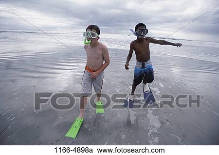 multiethnic, people, water, walking, beach, masks View Large Photo Image Stock Image - multiethnic, people, water, walking, beach, masks. Fotosearch