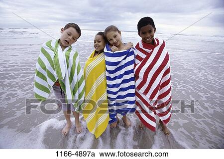 multiethnic, people, water, wrapped, beach, children View Large Photo Image Stock Image - multiethnic, people, water, wrapped, beach, children. Fotosearch