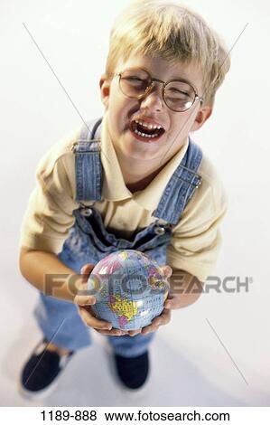 Stock Photo - overhead, people, playing, globe, eyeglasses, happy, laughing. Fotosearch
