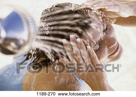 overhead, people, woman, spraying, outdoors, cool, shower View Large Photo Image Stock Image - overhead, people, woman, spraying, outdoors, cool, shower. Fotosearch