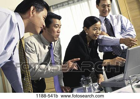people, Asian, computer, laptop, business, looking, observing View Large Photo Image Stock Image - people, Asian, computer, laptop, business, looking, observing. Fotosearch
