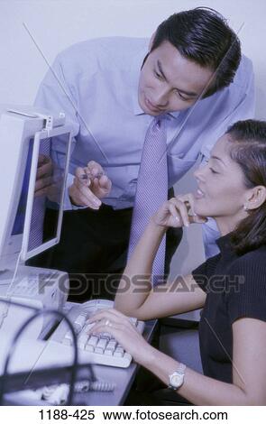 people, Asian, computer, pointing, business, point, helping View Large Photo Image Stock Photography - people, Asian, computer, pointing, business, point, helping. Fotosearch