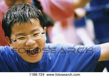 people, Asian, eyeglasses, excited, boy, joyous, yelling View Large Photo Image Picture - people, Asian, eyeglasses, excited, boy, joyous, yelling. Fotosearch