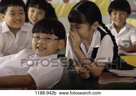 people, Asian, eyeglasses, school, classroom, gossiping, children View Large Photo Image Stock Image - people, Asian, eyeglasses, school, classroom, gossiping, children. Fotosearch