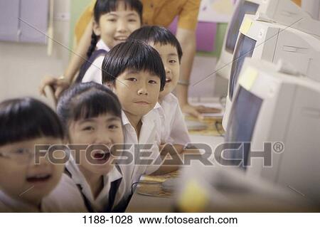 Stock Photo - people, Asian, school, computer, classroom, computers. Fotosearch