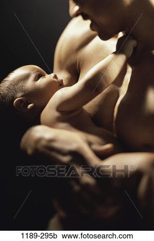 people, baby, family, father, parent, indoors, Father baby indoors View Large Photo Image Stock Image - people, baby, family, father, parent, indoors, Father baby indoors. Fotosearch