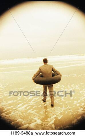 people, beach, inner tube, business, businessman, lifesaver View Large Photo Image Stock Image - people, beach, inner tube, business, businessman, lifesaver. Fotosearch
