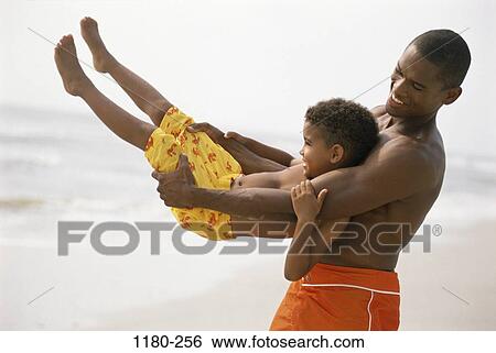 people, beach, playful, adventurous, joyous, family View Large Photo Image Stock Photograph - people, beach, playful, adventurous, joyous, family. Fotosearch