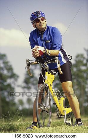 people, bicycle, helmet, sunglasses, outdoors, sports View Large Photo Image Stock Image - people, bicycle, helmet, sunglasses, outdoors, sports. Fotosearch