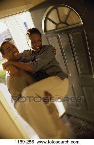 people, blur, home, smiling, new, couple, door View Large Photo Image Stock Photograph - people, blur, home, smiling, new, couple, door. Fotosearch