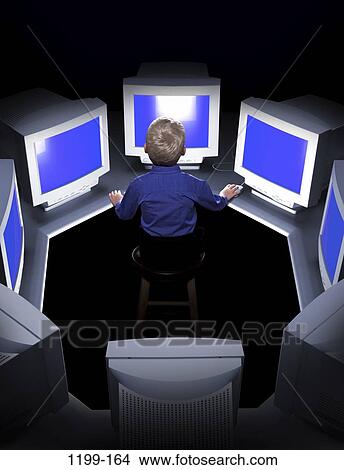 Picture - people, boy, business, computers, child, using. Fotosearch