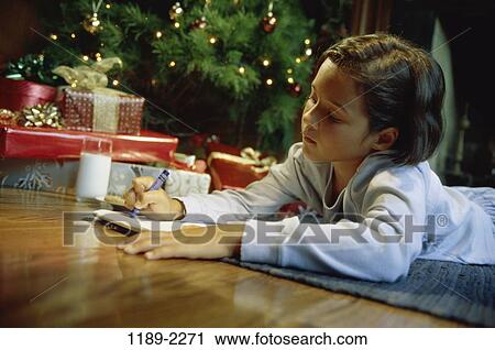 people, Christmas, coloring, girl, writing, gifts, presents View Large Photo Image Stock Image - people, Christmas, coloring, girl, writing, gifts, presents. Fotosearch