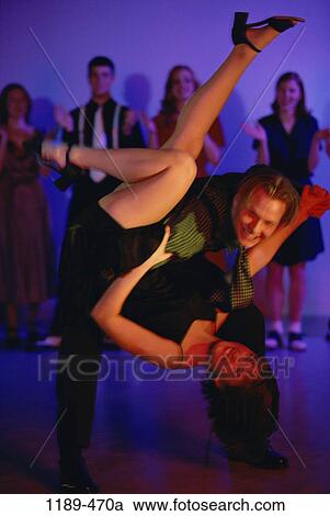 Stock Image - people, clapping, couple, dancing, swinging, swing, dance. Fotosearch