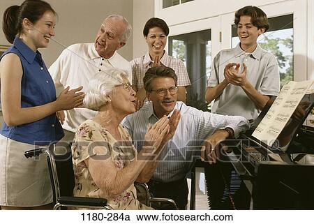 people, clapping, eyeglasses, music, piano, wheelchair View Large Photo Image Stock Image - people, clapping, eyeglasses, music, piano, wheelchair. Fotosearch