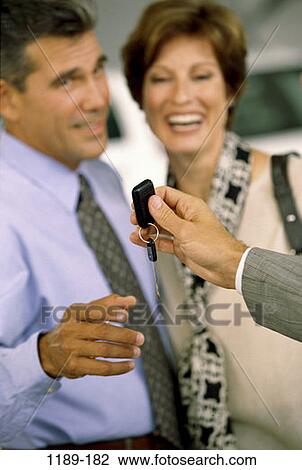 people, couple, car, happy, Middle-aged, shopping, salesman View Large Photo Image Stock Image - people, couple, car, happy, Middle-aged, shopping, salesman. Fotosearch