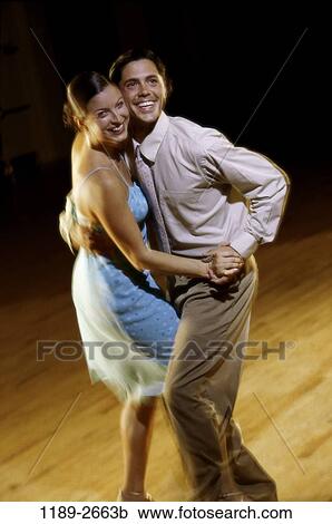 people, couple, dancing, nightlife, indoors, young adult, Young couples nightlife View Large Photo Image Stock Image - people, couple, dancing, nightlife, indoors, young adult, Young couples nightlife. Fotosearch