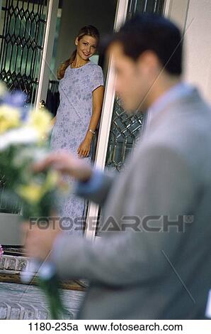 people, couple, door, flowers, outdoors, court, surprise View Large Photo Image Stock Image - people, couple, door, flowers, outdoors, court, surprise. Fotosearch