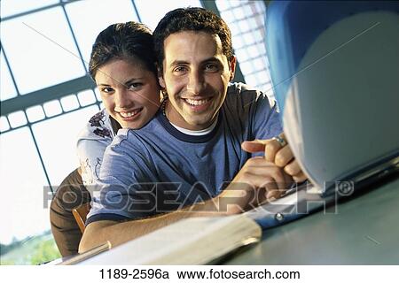 people, couple, Hispanic, laptop, studying, education, college View Large Photo Image Stock Image - people, couple, Hispanic, laptop, studying, education, college. Fotosearch