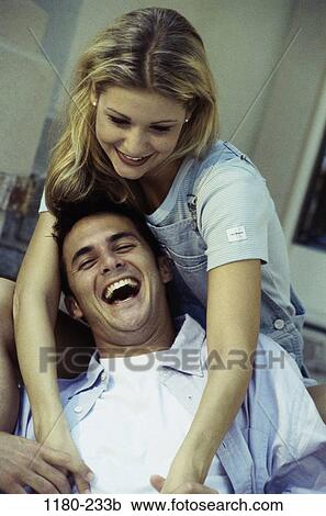 people, couple, outdoors, young adult, Young couples outdoors View Large Photo Image Stock Image - people, couple, outdoors, young adult, Young couples outdoors. Fotosearch