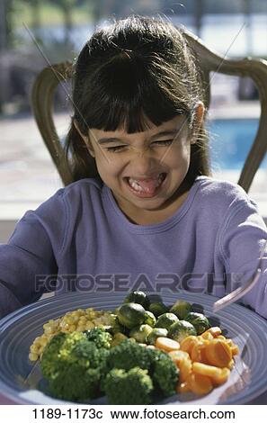 Stock Image - people, eating, girl, child, eat, kid, Girls eating. Fotosearch
