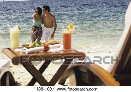 people, eating, table, walking, Asian, couple View Large Photo Image Stock Photo - people, eating, table, walking, Asian, couple. Fotosearch