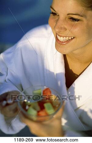 people, eating, woman, smiling, morning, fruit, breakfast View Large Photo Image Stock Photo - people, eating, woman, smiling, morning, fruit, breakfast. Fotosearch