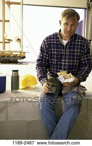 Stock Photo - people, eating, worker, outdoors, Middle-aged, blond. Fotosearch