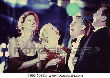 people, formal, laughing, Middle-aged, nightlife, indoors View Large Photo Image Stock Image - people, formal, laughing, Middle-aged, nightlife, indoors. Fotosearch