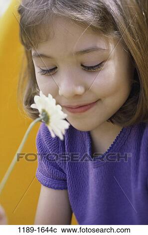 Stock Image - people, girl, flower, outdoors, child, kid, Girls flowers. Fotosearch