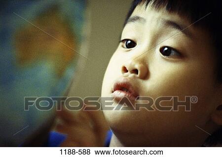 people, globe, Asian, face, boy, curious, child View Large Photo Image Stock Photo - people, globe, Asian, face, boy, curious, child. Fotosearch