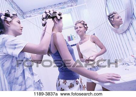 people, hair, teens, bath, beauty, bathroom View Large Photo Image Stock Image - people, hair, teens, bath, beauty, bathroom. Fotosearch