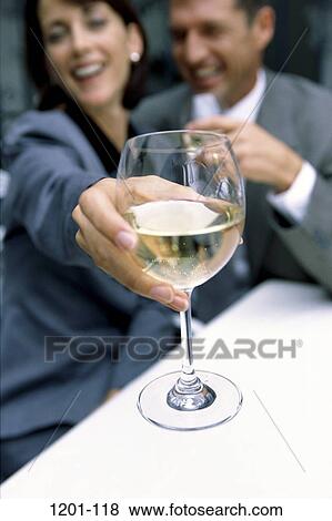 people, hand, glass, couple, toasting, wine, drinking View Large Photo Image Stock Photo - people, hand, glass, couple, toasting, wine, drinking. Fotosearch