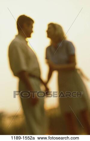 people, hands, blur, talking, couple, holding, silhouette View Large Photo Image Stock Image - people, hands, blur, talking, couple, holding, silhouette. Fotosearch