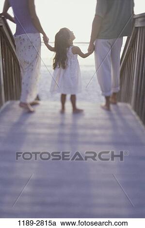 people, hands, Hispanic, beach, holding, back, family View Large Photo Image Stock Image - people, hands, Hispanic, beach, holding, back, family. Fotosearch