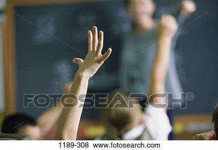 people, hands, teacher, school, raised, enthusiastic, classroom View Large Photo Image Stock Photo - people, hands, teacher, school, raised, enthusiastic, classroom. Fotosearch