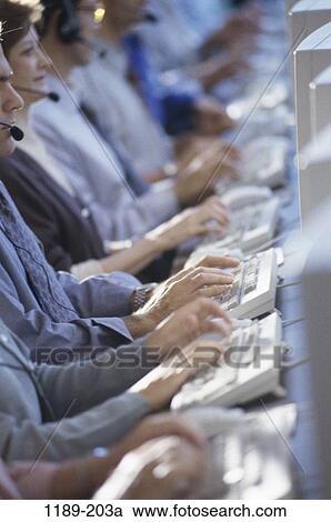 Stock Image - people, hands, typing, business, body parts, computers. Fotosearch