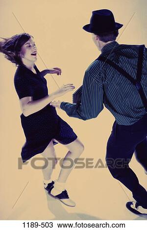people, hat, couple, dancing, swing, nightlife, enjoyment View Large Photo Image Stock Image - people, hat, couple, dancing, swing, nightlife, enjoyment. Fotosearch