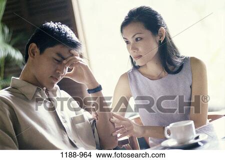 people, headache, lost, Asian, couple, coffee View Large Photo Image Picture - people, headache, lost, Asian, couple, coffee. Fotosearch