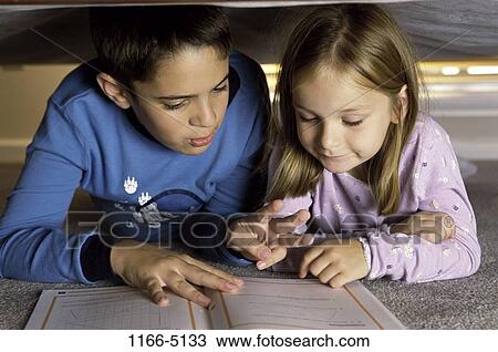 people, hiding, reading, bed, book, fingers, children View Large Photo Image Stock Image - people, hiding, reading, bed, book, fingers, children. Fotosearch