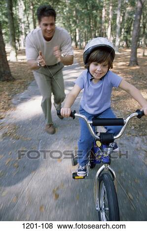 people, Hispanic, bicycle, helmet, riding, outdoors, challenges View Large Photo Image Stock Photo - people, Hispanic, bicycle, helmet, riding, outdoors, challenges. Fotosearch
