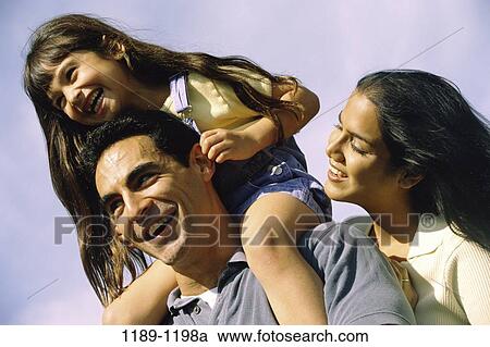 people, Hispanic, laughing, riding, outdoors, carrying, unity View Large Photo Image Stock Image - people, Hispanic, laughing, riding, outdoors, carrying, unity. Fotosearch